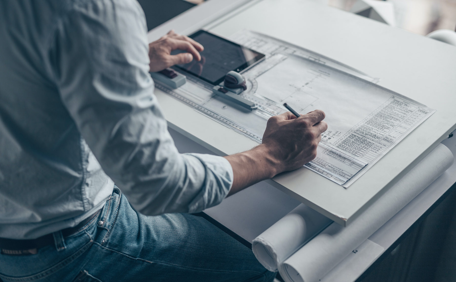 Young architect in the workplace