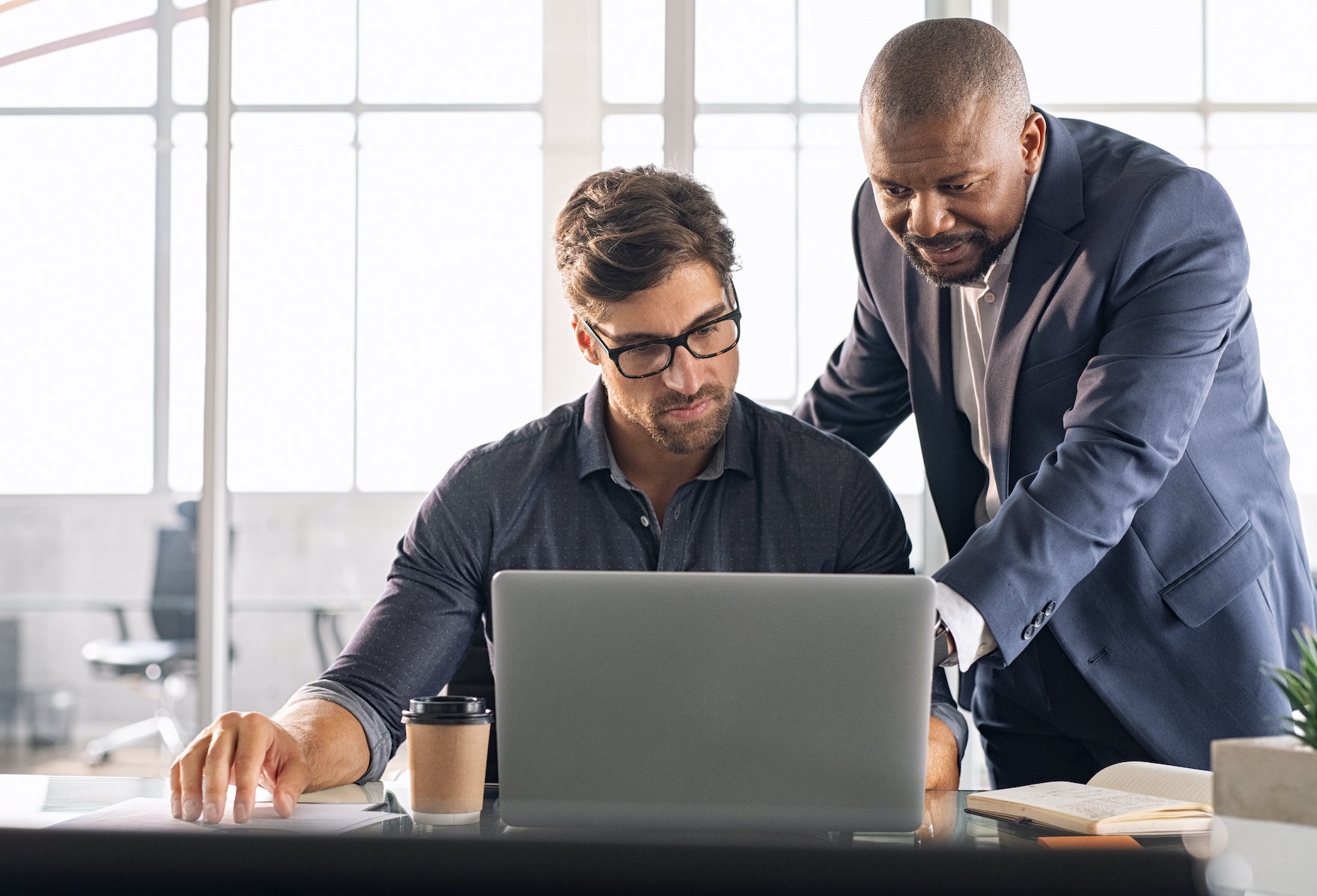 Leadership working with his employee